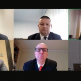 Photo of Defence team via video-link